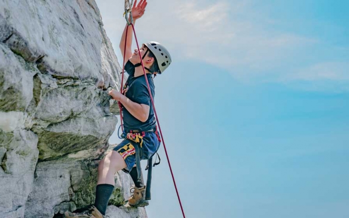 teens learn rock climbing skills potomac river